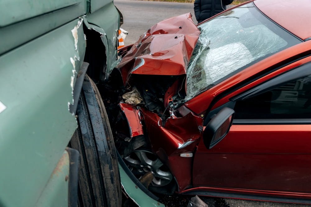Severe car accident damage illustrating disputed liability in Fort Lauderdale crash