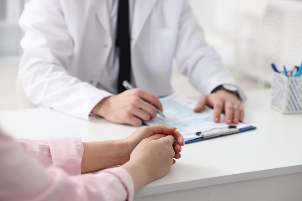 Healthcare provider meeting with a patient during a Florida medical negligence case review